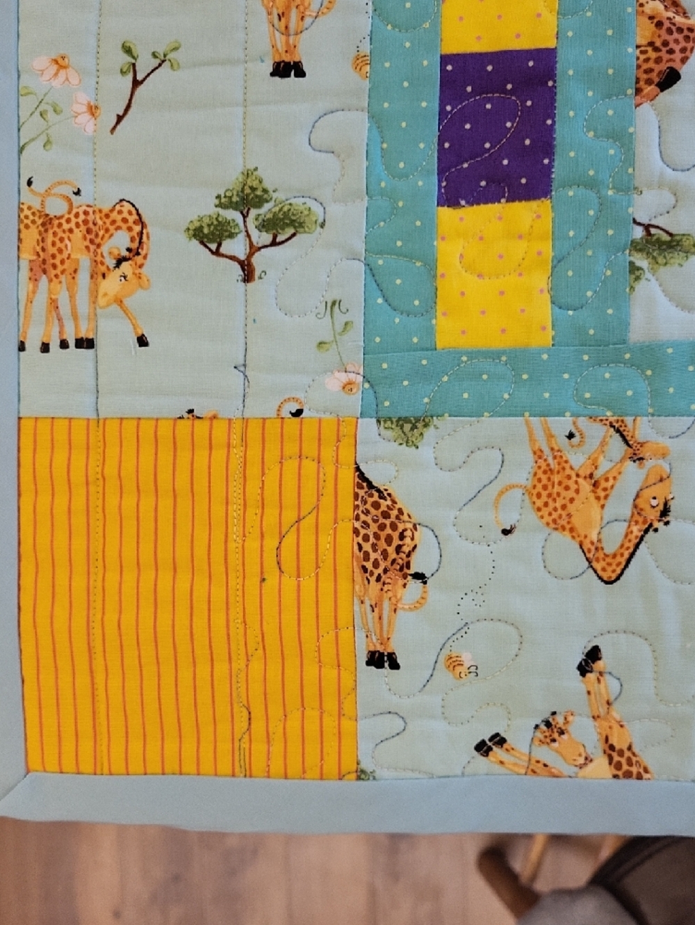 Patchwork Baby " Zoe the Giraffi" Quilt in Aqua, Orange, Yellow & Purple - Picture 4 of 6